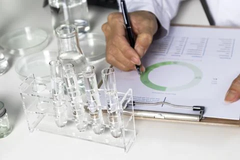 Researchers study data and experiment with chemicals, scientific process, r.. Stock Photos