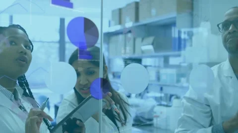 Researchers tapping tablet coding on transparent wall animated charts emerging Stock Footage 317740345