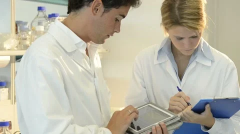 Researchers Using Tablet PC Stock Footage 8662806