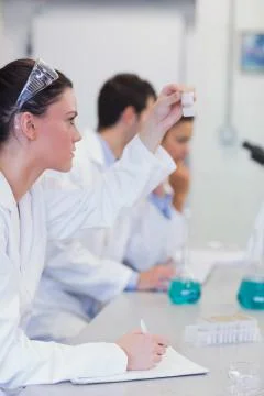 Researchers working on experiments in the laboratory Foto stock