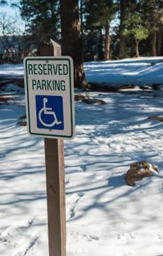 Reserved parking sign in snow season Stock Photos