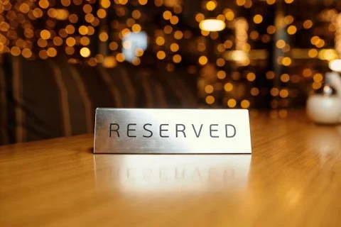 Reserved plate on a table Stock Photos