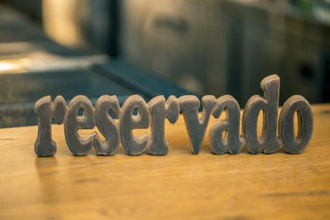 Reserved plate on the table in a restaurant Stock Photos