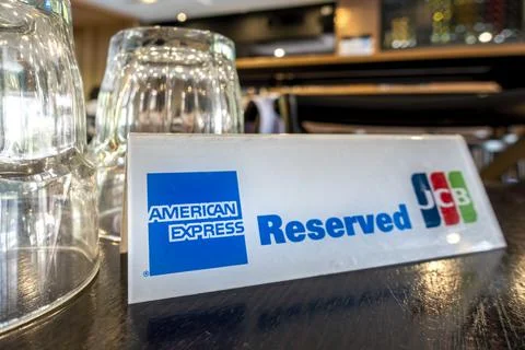 Reserved restaurant table plastic sign Stock Photos