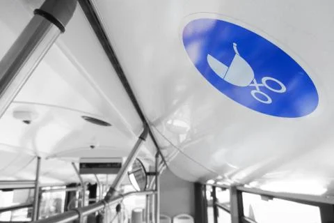 Reserved seat label onboard bus for baby carriage Stock Photos