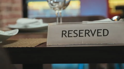 Reserved Sign on Restaurant Table Stock Footage 234915327