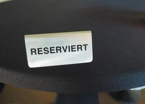 Reserviert (reserved) table sign Stock Photos