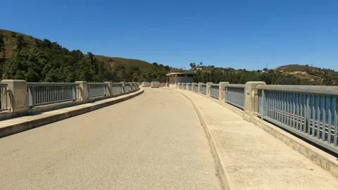 Reservoir Bridge with cyclists Video stock 152637205