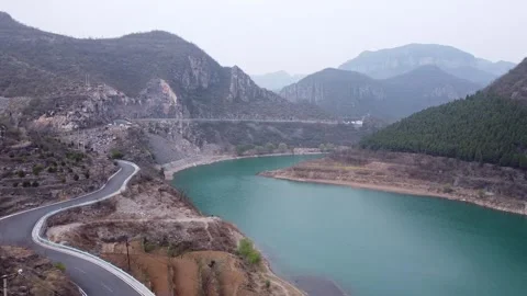 Reservoir distant mountains Stock Footage 247363241