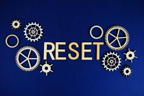 Reset alphabet letters with gears element on navy blue background Stock Photos