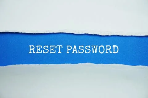Reset Password message written on blue paper with torn paper background 스톡 사진