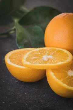 Resh oranges in a black background Stock Photos