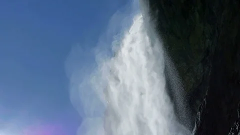 Resh sping water falling down on natural waterfall Stock Footage 72870099