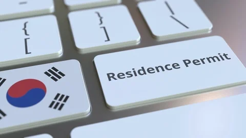 Residence Permit text and flag of South Korea on the buttons on the computer Stock Footage 123016925