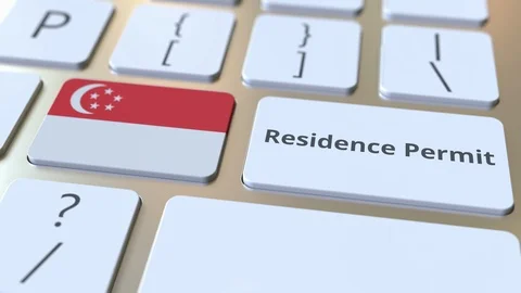 Residence Permit text and flag of Singapore on the buttons on the computer Stock Footage 123045356