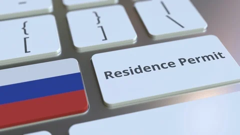 Residence Permit text and flag of Russia on the buttons on the computer keyboard Stock Footage 123046023