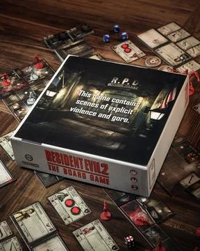 Resident Evil 2 board game components close up featuring zombie miniatures .. Foto stock