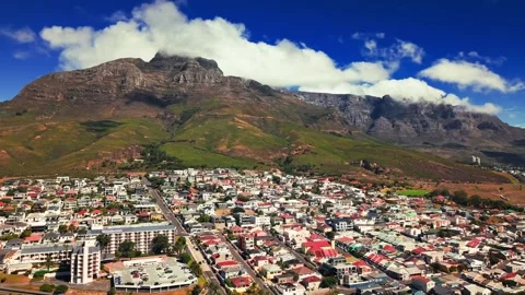 Residential area below Table Mountain with rolling clouds Stock Footage 332299875