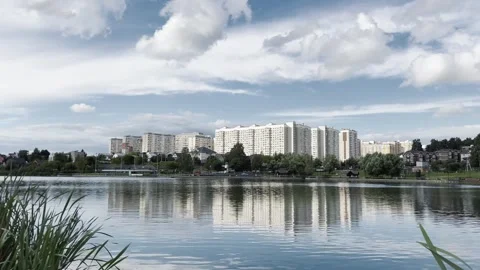 Residential area, panoramic view, beautiful sky with reflection in water Vídeo Stock 281071731