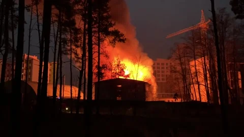 A residential building is on fire at night. Stock Footage 165241399