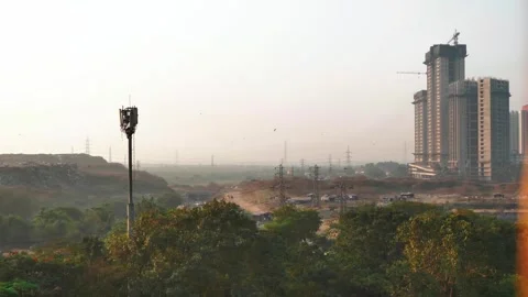 A residential complex next to a smog filled polluted environment Stock Footage 277869291