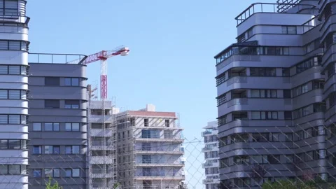 Residential construction development with tower crane in Madrid 스톡 동영상 335484915