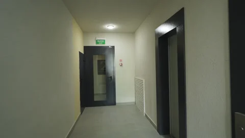 Residential corridor with elevators and floor number sign Vídeo Stock 330522506