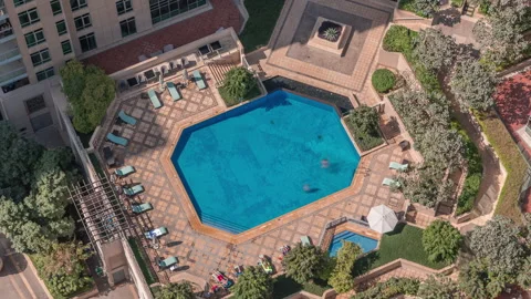 Residential courtyard pool daytime timelapse Downtown Dubai perspective Stock Footage 337945648