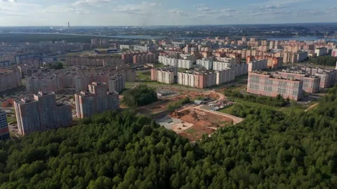 Residential Development Meets Nature: Construction Site by the Woods Stock Footage 257775642
