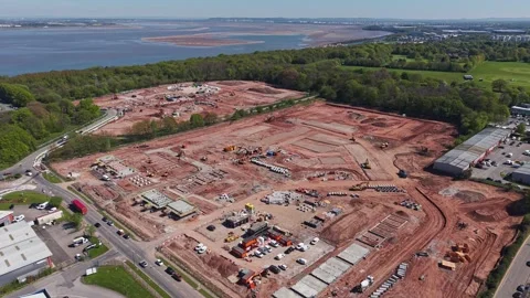 Residential development under construction on River Mersey waterfront Stock Footage 334799918