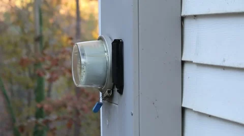 Residential Electrical Meter on the Side of a House Stock Footage 43670672
