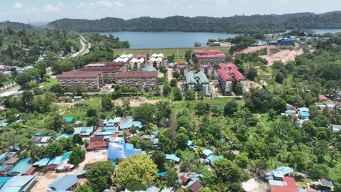 Residential settlements located downstream of the Mukakuning reservoir Stock Footage 250710039