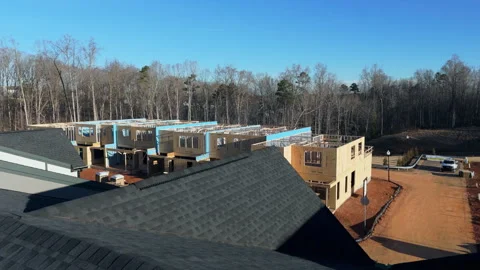 Residential Subdivision Under Construction With Modern Townhouses In Framing Stock Footage 333149484