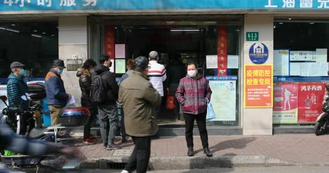 Residents in long queue to buy allocated ration face masks amid Covid-19 Stock Footage 126215603