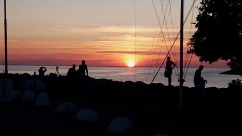 Residents of Malmo watching the sunset Stock Footage 256428294