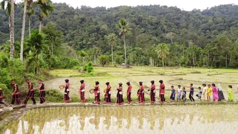 Residents parading in the fields on the slopes of the hill. Stock Footage 166441751