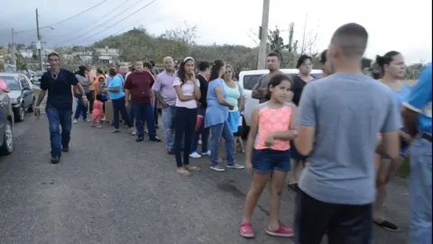 Residents queue for relief supplies after Hurricane Maria Stock-Footage 87736858