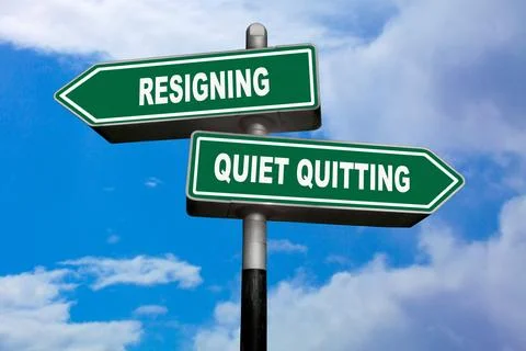 Resigning vs Quiet quitting - Direction signs Stock Photos
