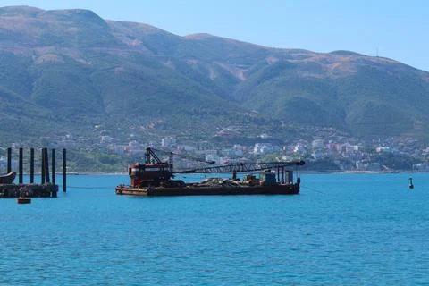 Resilient Rust: Exploring the Mystique of an Old Sea Crane Stock Photos