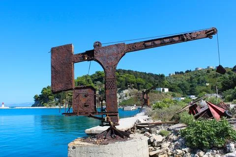 Resilient Rust: Exploring the Mystique of an Old Sea Crane Stock Photos