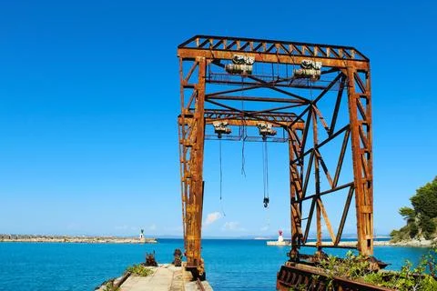 Resilient Rust: Exploring the Mystique of an Old Sea Crane Stock Photos