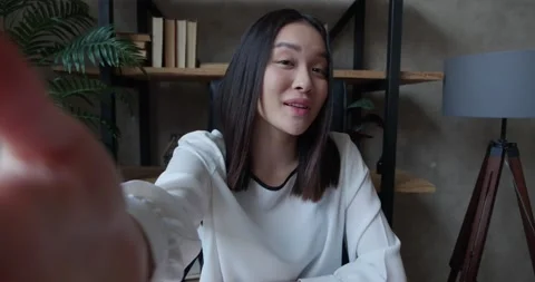 Resolution Point of view shot of Beautiful young Asian girl talking and Video stock 160033218