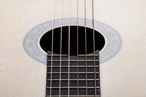 Resonator of a classical guitar with the strings. Stock Photos