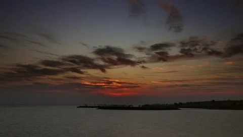 Resort beach with parasol and sea sunrise 動画素材 169043053