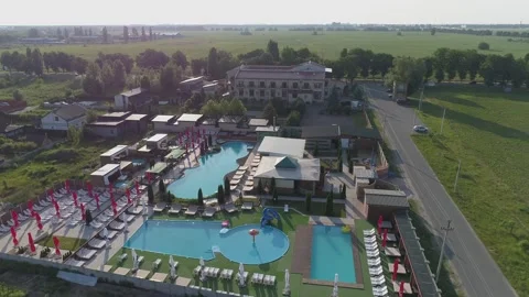 A resort complex with several swimming pools. Drone filming Stock Footage 311483807