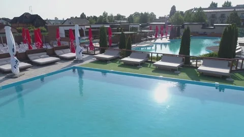 A resort complex with several swimming pools. Drone filming Video stock 311483864