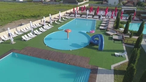 A resort complex with several swimming pools. Drone filming Stock Footage 311483867