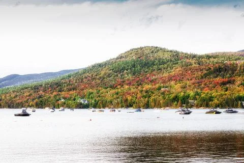 The resort on the lake with mountains Stock Photos