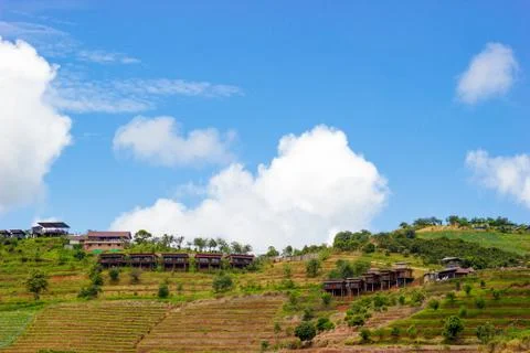 Resort on mountain with blue sky and white cloud. Stock Photos