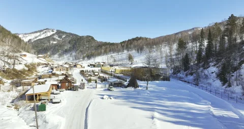 Resort in mountain hollow protected from harsh weather Stockbeeldmateriaal 318740760